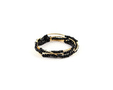 Medusa's Heirlooms Swarovski Jewelry with black beads and gold metal design.
