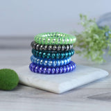 Large Lauren Lane Hair Coil Set in Ice color, no tug, no crease, shrinkable hair coils for all hair types