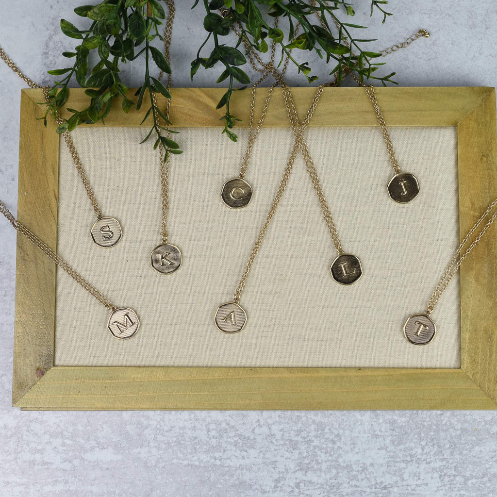 Antiqued gold medallion coin letter necklace with 15 inch chain and extender