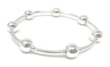 Silver and gold friendship bracelet with gemstone beads and sterling silver components.