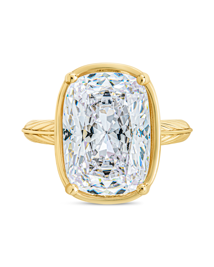 Sterling silver elongated cushion cocktail ring with clear cubic zirconia stone and gold plating