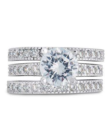 Set of three sterling silver rings with brilliant cubic zirconia and two band accents