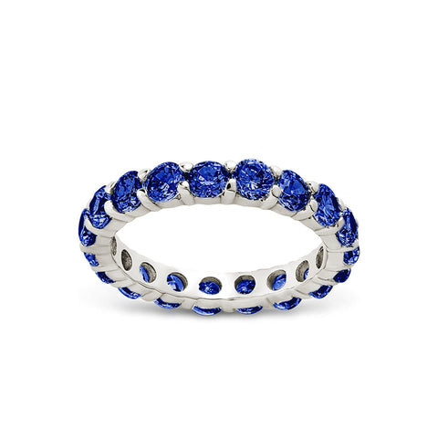 Sterling silver eternity ring with sapphire cubic zirconia stones, 3mm band, modern and sleek design